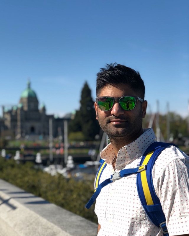 Vyaas Srinivasan outdoors, smiling at the camera